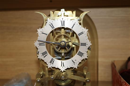 A skeleton clock under dome clock 27cm